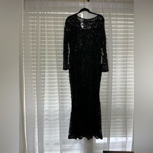 Dressy floor length black dress with a little sparkle & long sleeves